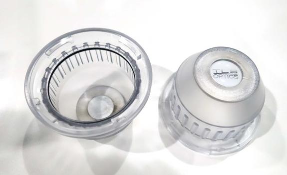 Two TLS PL Lens Caps, side by side